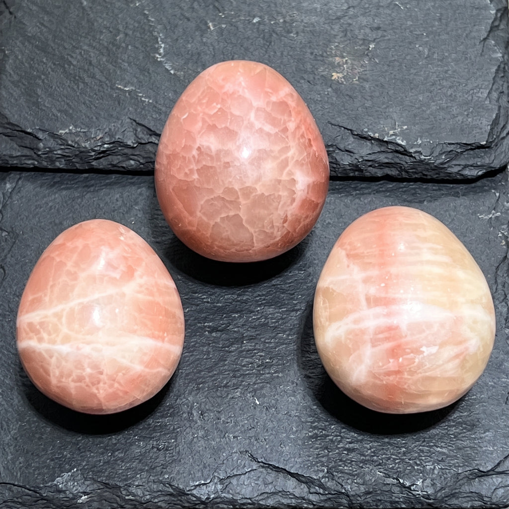 Red Calcite Crystal Egg Polished Carving