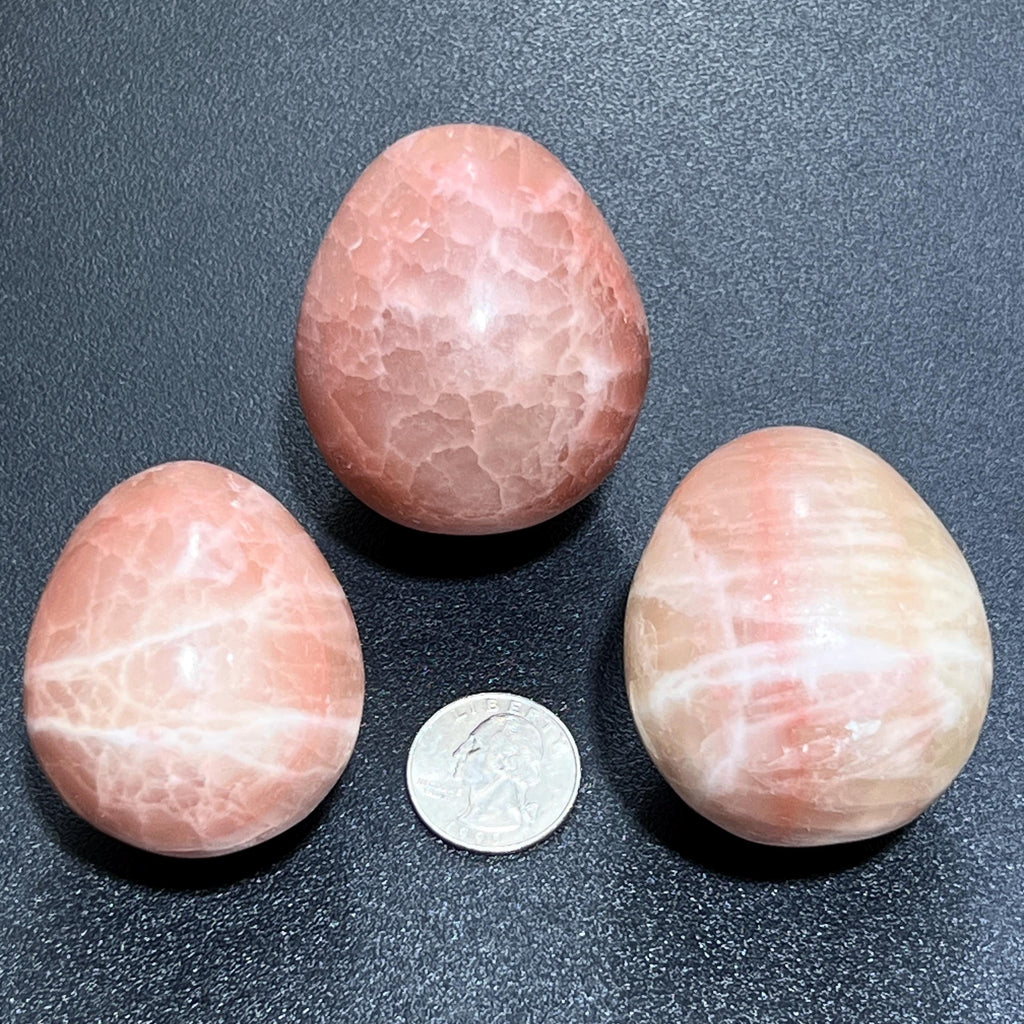 Red Calcite Crystal Egg Polished Carving