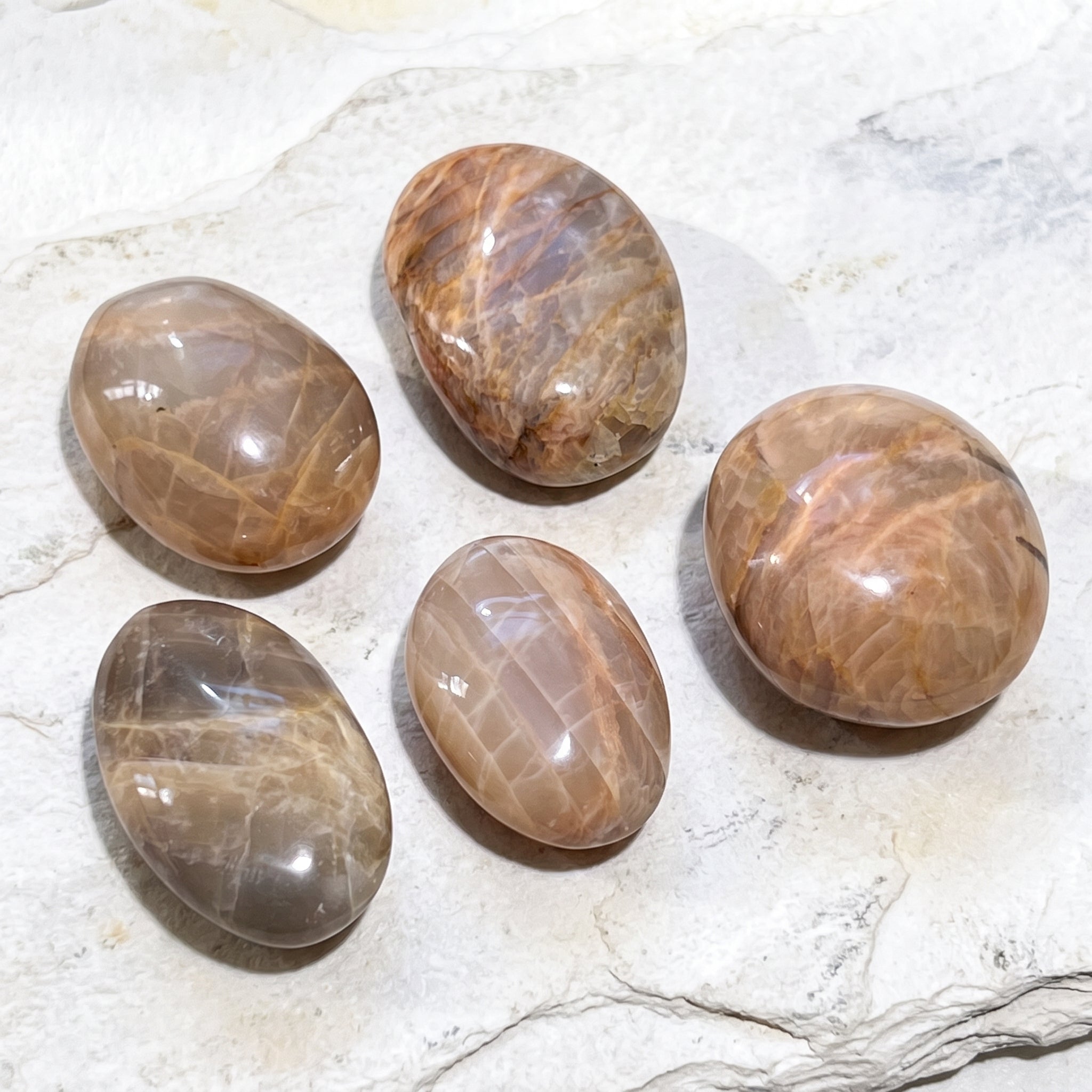 Peach Moonstone Flashy Palm Stone Carving