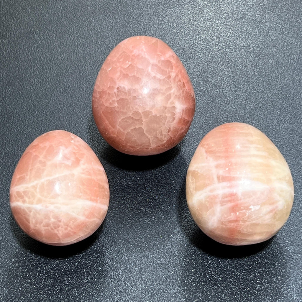 Red Calcite Crystal Egg Polished Carving