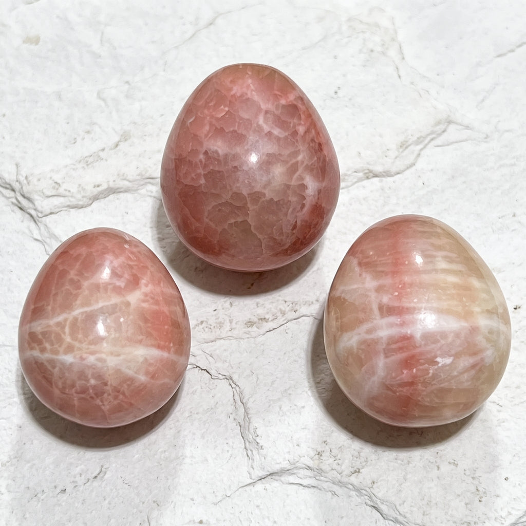 Red Calcite Crystal Egg Polished Carving